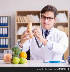 The scientist studying nutrition in various food. Scientist studying nutrition in various food
