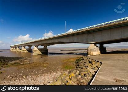 The Second Severn crossing is a bridge that carries the M4 motorway over the Bristol Channel or River Severn Estuary between England and Wales, United Kingdom. Morning light from the east.