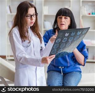 The senior patient visiting doctor for regular check-up. Senior patient visiting doctor for regular check-up