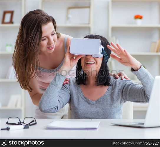 The senior woman experiencing virtual reality glasses. Senior woman experiencing virtual reality glasses