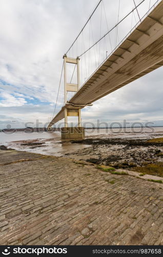 The Severn Crossing suspension Bridge north side, Portrait. Beachley, England, United Kingdom