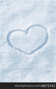 The shape of heart painted on the white snow