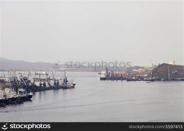 The ships in port early in the morning wait for unloading