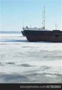 The ships on the frozen lake in the winter in Petrozavodsk, Russia