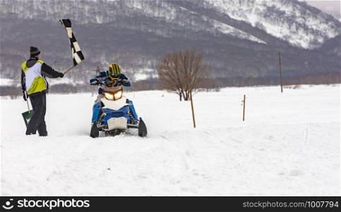 The show on the holiday competition snowmobiles in Kamchatka