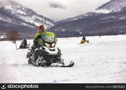 The show on the holiday competition snowmobiles in Kamchatka