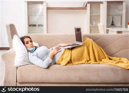 The sick pregnant woman suffering at home . Sick pregnant woman suffering at home