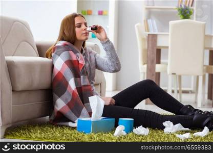 The sick woman suffering from flu at home. Sick woman suffering from flu at home