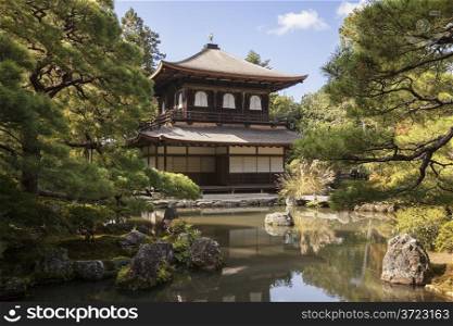 The Silver Pavilion, or Ginkakuji, in the Joshoji complex in Kyoto is a classically styled traditional pavilion looking out over the garden and ponds.