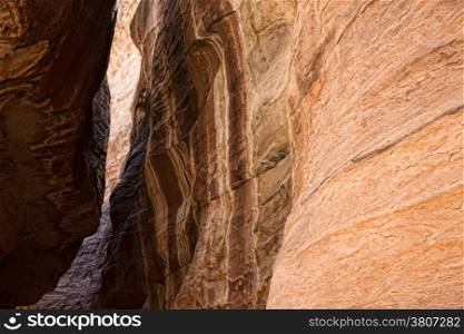 The Siq, the narrow slot-canyon that serves as the entrance passage to the hidden city of Petra, Jordan,