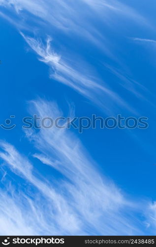 The sky is blue with clouds in beautiful, strangely patterned lines.