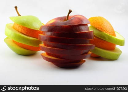 The sliced apples and orange