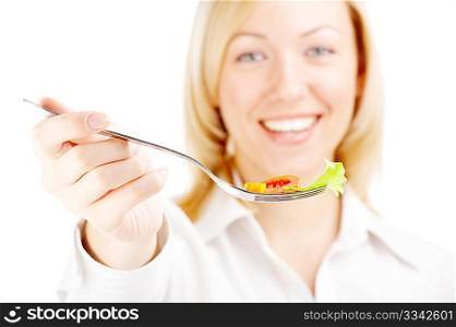 The smiling blonde holds a plug with the salad, isolated