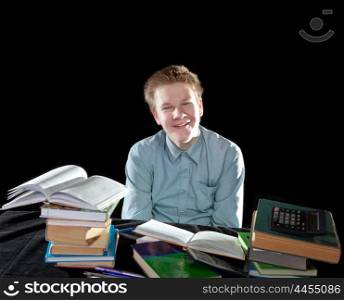 The smiling pupil with textbooks