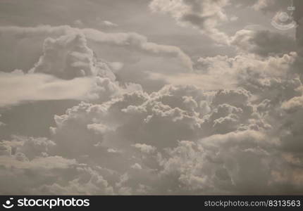 The softness of the cloud with the light shining from the sun. The shape of the clouds evokes imagination and creativity, They can be used as wallpaper. Space for text, Selective focus.