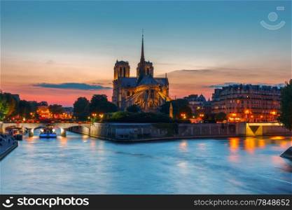 The southern facade of Cathedral of Notre Dame de Paris at sunset