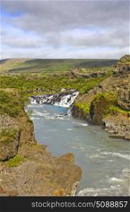 The spectacular Hraunfossar cascades in Iceland