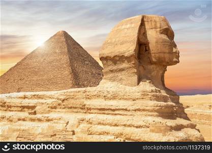 The Spinx of Giza and the Pyramid of Cheops, Cairo, Egypt.