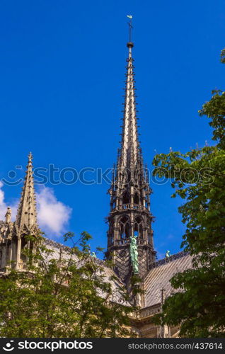 The spire of the cathedral Notre-Dame originally in place between the 13th and 18th centuries, and recreated in the 19th century destroyed in a fire in 2019, Paris, France. Spire of Cathedral of Notre Dame de Paris, France