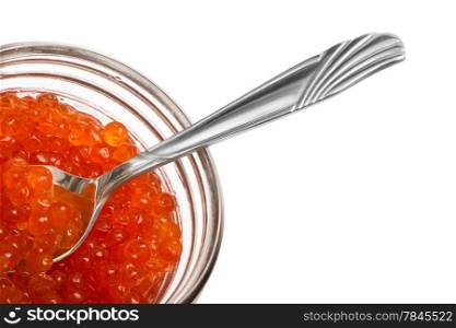 The spoon and red caviar in glass can