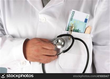 the stethoscope and a doctor&acute;s bills. two klasen medicine.
