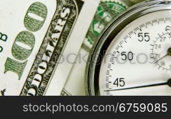 The stopwatch on the dollar cash