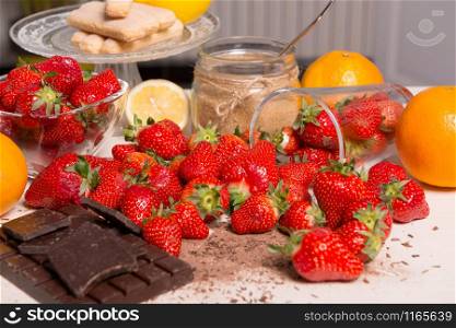 the strawberries with a dark chocolate bar