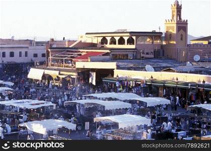 The Streetfood and Nightlife at the Djemma del Fna Square in the old town of Marrakesh in Morocco in North Africa.&#xA;