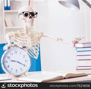 The student skeleton preparing for exams. Student skeleton preparing for exams
