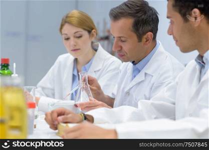 the students experimenting in laboratory