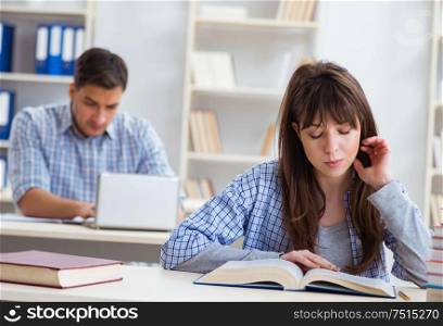 The students sitting and studying in classroom college. Students sitting and studying in classroom college