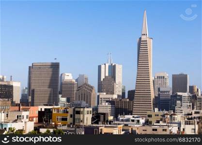 The Sun get low over the recognizable downtown skyline of San Francisco