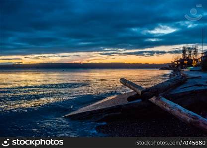 The sun is setting behind the Puget Sound in Washington State.