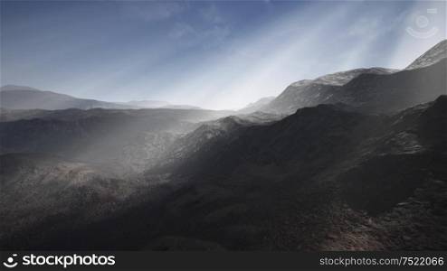 the sun&rsquo;s rays against the backdrop of the mountains and the lava-rocky wet shore in the foreground. Sun Rays against the Backdrop of the Mountains