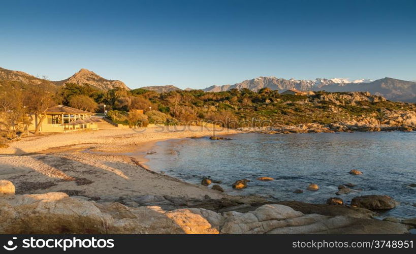 The sun setting over the beach at Arinella Plage near Lumio in the Balagne region of Corsica