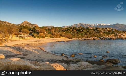 The sun setting over the beach at Arinella Plage near Lumio in the Balagne region of Corsica