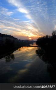 The sun setting over the River, Timisoara, Romania.