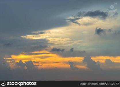 The sun shines through the clouds in the sunset sky with dramatic light. The shape of the clouds evokes imagination and creativity. They can be used as wallpapers that look amazing. Copy space, No focus, specifically.