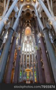 The sun shines through the stained glass windows of Gaudi&rsquo;s masterpiece: La Sagrada Familia