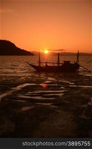 the sunset at the Harbour at the coast of the Andaman sea of Myeik in the south in Myanmar in Southeastasia.. ASIA MYANMAR BURMA MYEIK ANDAMAN SEA