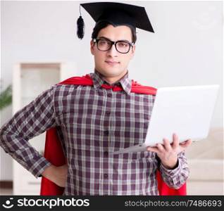 The super hero student wearing mortarboard and holding a laptop. Super hero student wearing mortarboard and holding a laptop