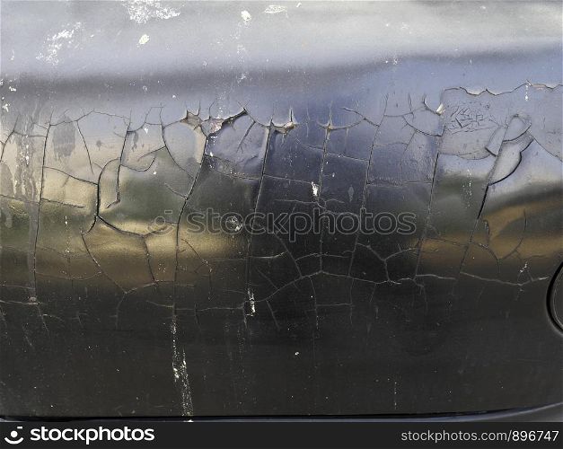 The surface of the car color is cracked, because it is not maintained and used for a long time.
