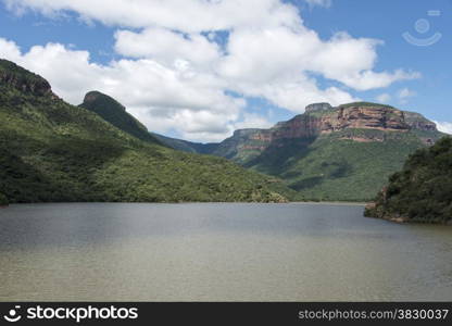 the swadini dam near the blyde river with the dragensberg as background