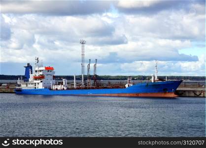 The tanker is moored in the port