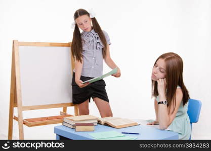 The teacher went to sleep as the student answered at the blackboard