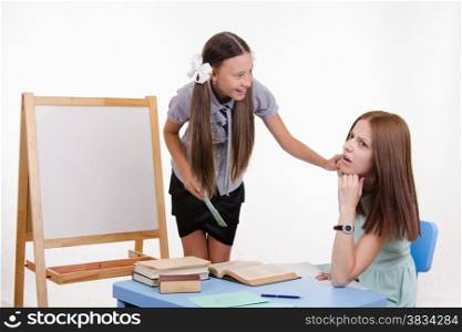 The teacher went to sleep as the student answered at the blackboard