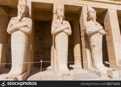 The temple of Hatshepsut near Luxor in Egypt. Statues on facade of palace of Hatshepsut