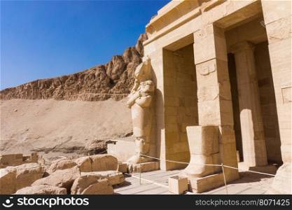 The temple of Hatshepsut near Luxor in Egypt. Statues on facade of palace of Hatshepsut