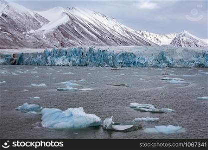 The terminus of the Monaco Glacier in Woodfjorden in the Svalbard Islands (Spitsbergen) in the high Arctic.