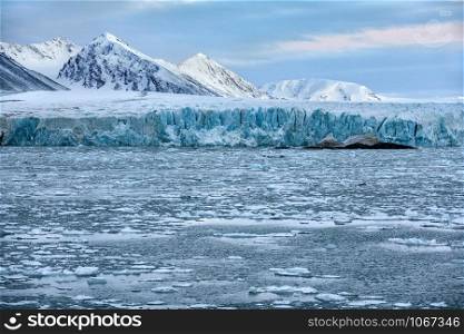 The terminus of the Monaco Glacier in Woodfjorden in the Svalbard Islands (Spitsbergen) in the high Arctic.